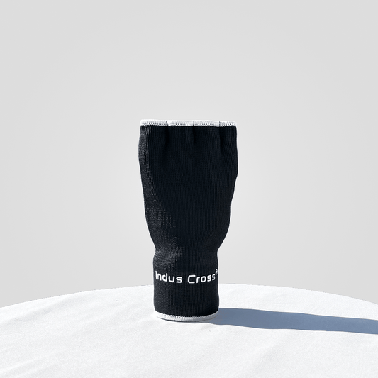 Black inner gloves with 'Indus Cross' branding