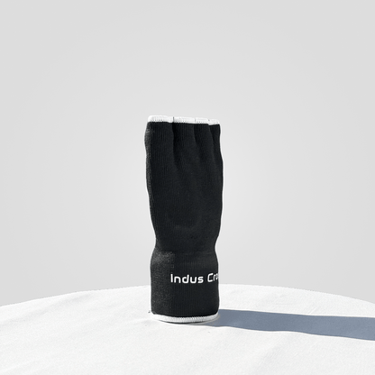 Black inner glove with 'Indus Cross' branding