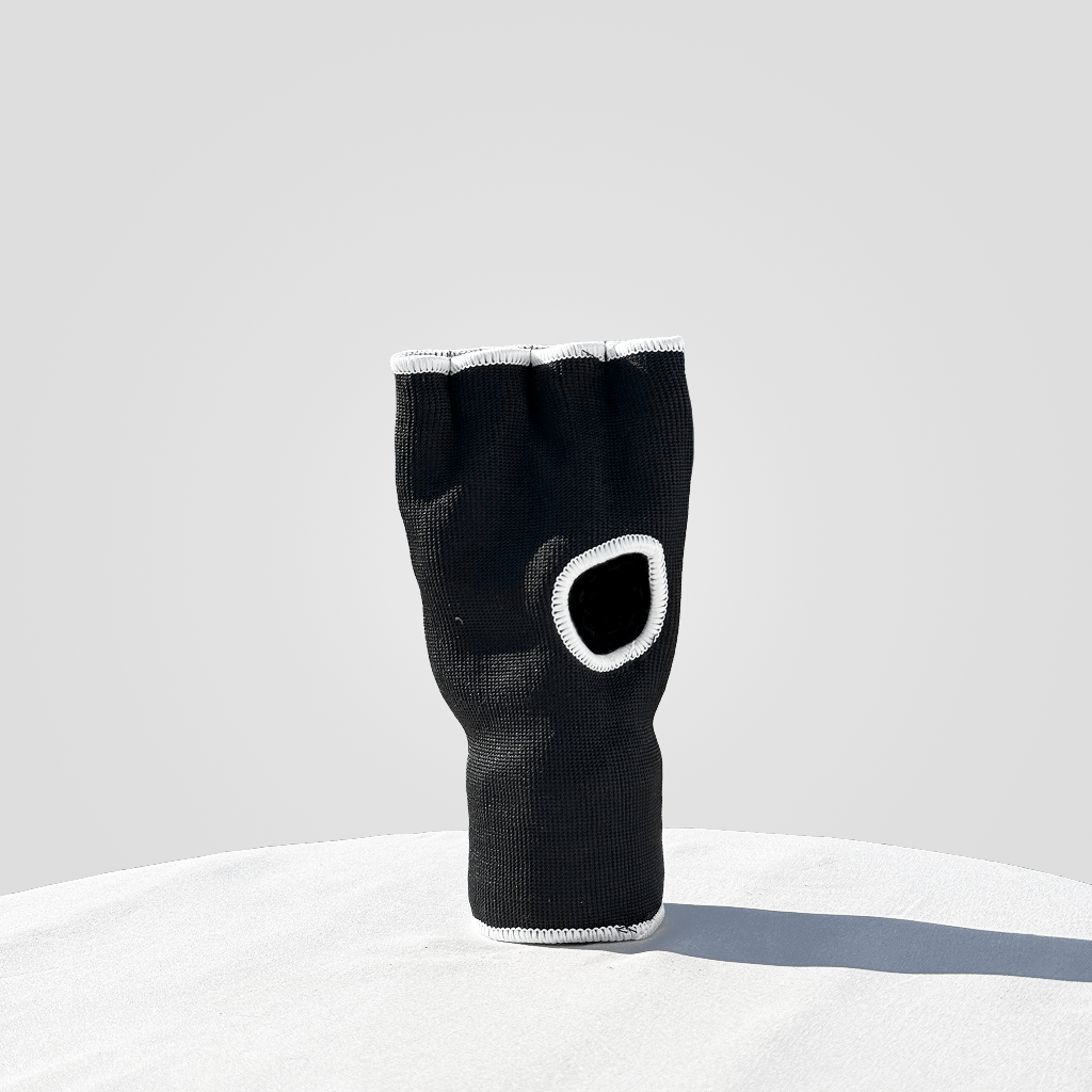 Black inner glove with 'Indus Cross' branding