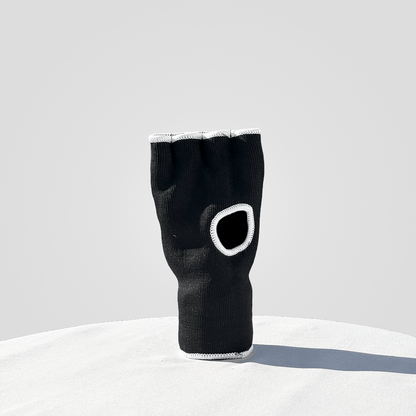 Black inner glove with 'Indus Cross' branding
