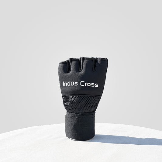 Black gel glove with 'Indus Cross' branding on a light gray background