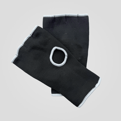 Pair of inner gloves with 'Indus Cross' branding
