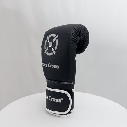 Black boxing glove with 'Nodus Cross' branding on a white background