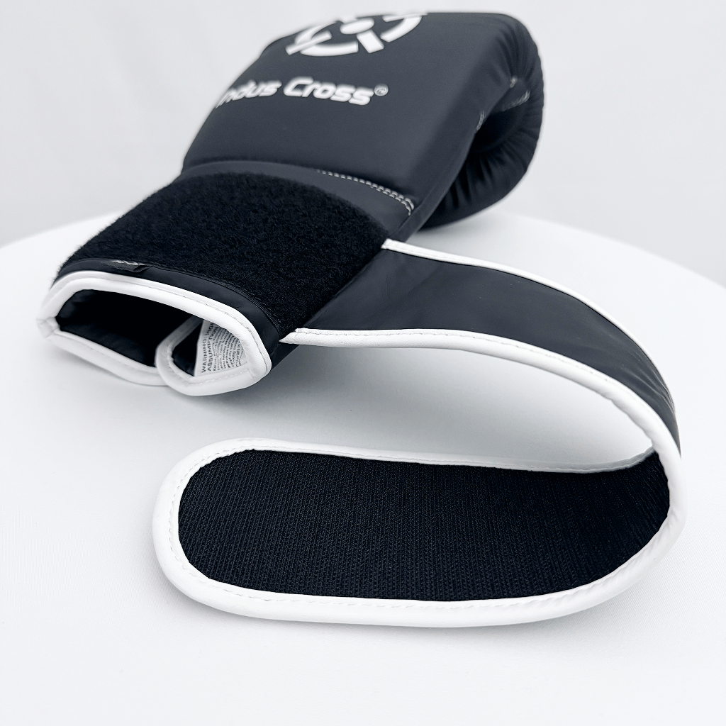 Black and gray boxing gloves with 'Indus Cross' branding on a white background