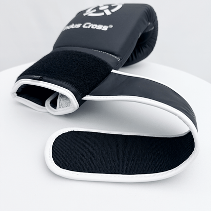 Black and gray boxing gloves with 'Indus Cross' branding on a white background