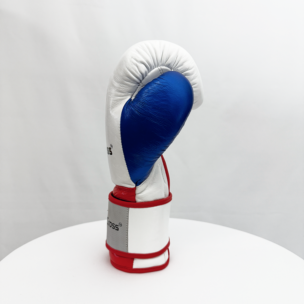 White boxing glove with blue and red accents on a white background