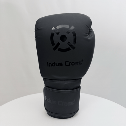 Black boxing glove with 'Indus Cross' branding on a white background