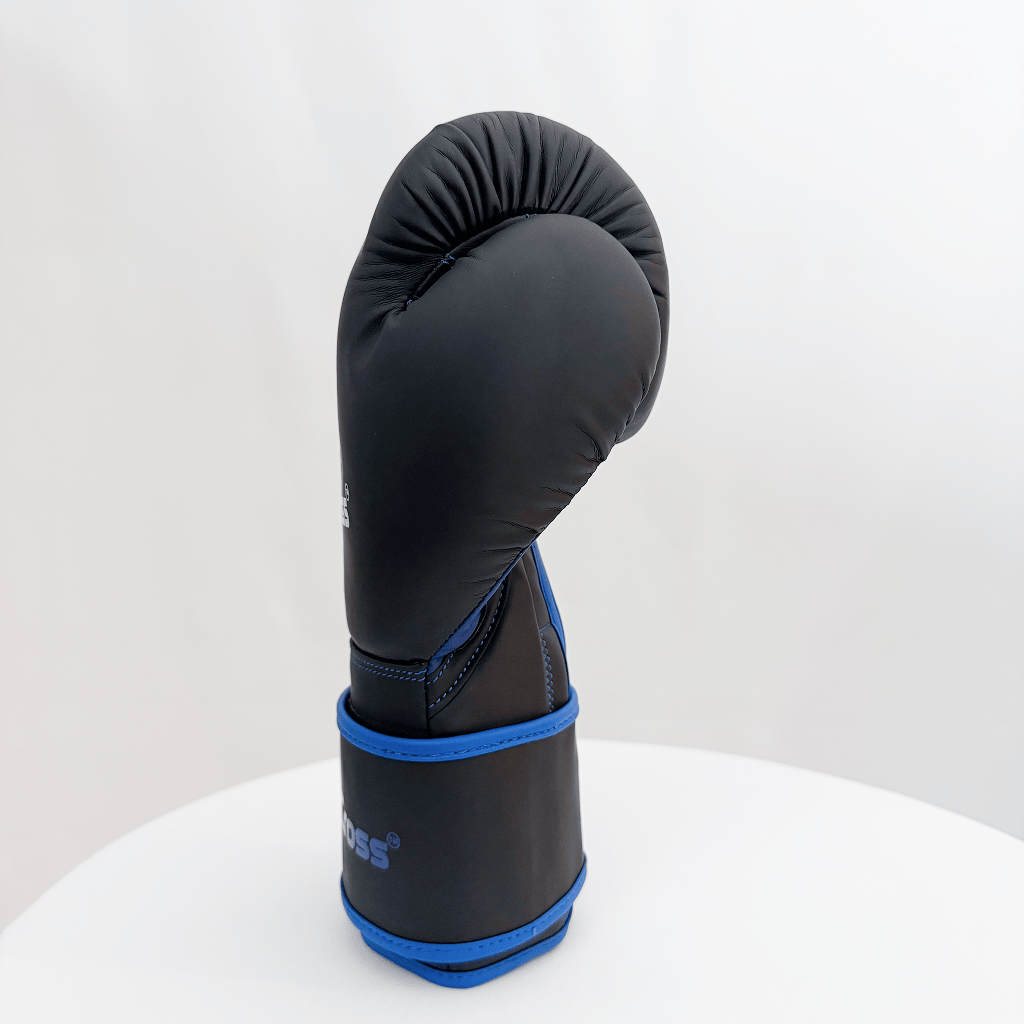 Black boxing glove with blue trim on a white background