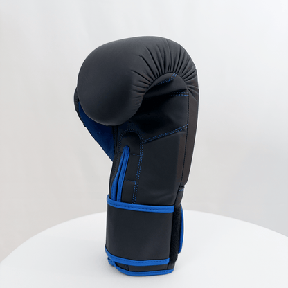 Black and blue boxing glove on a white background