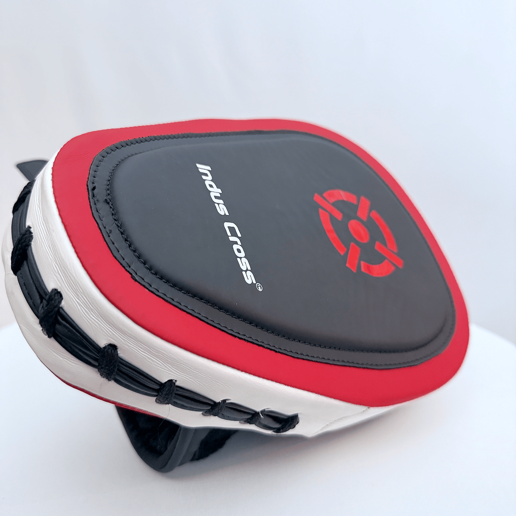 Red and black boxing mitts with 'Indus Cross' branding on a white background