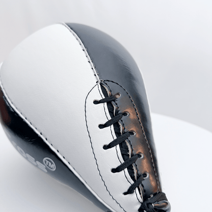 Black and white speed bag with 'Indus Cross' branding on a light gray background