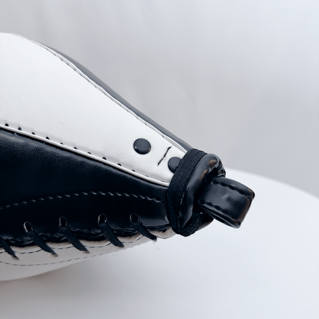 Black and white speed bag with 'Indus Cross' branding on a light gray background