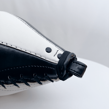 Black and white speed bag with 'Indus Cross' branding on a light gray background