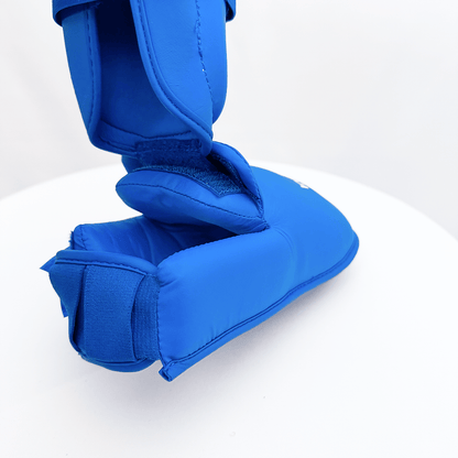 Closeup of blue shin guard on a white background