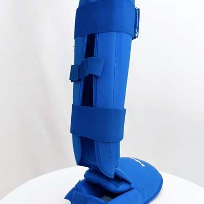 Blue protective shin guard on a white background