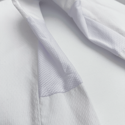 Close-up of karate suit on a light gray background