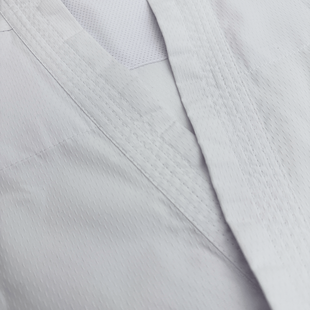 Close-up of karate suit on a light gray background
