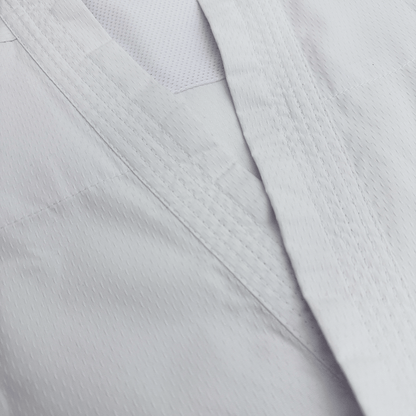 Close-up of karate suit on a light gray background