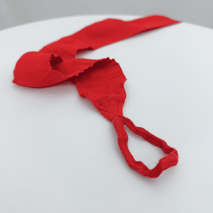 Red hand wrap on a white surface