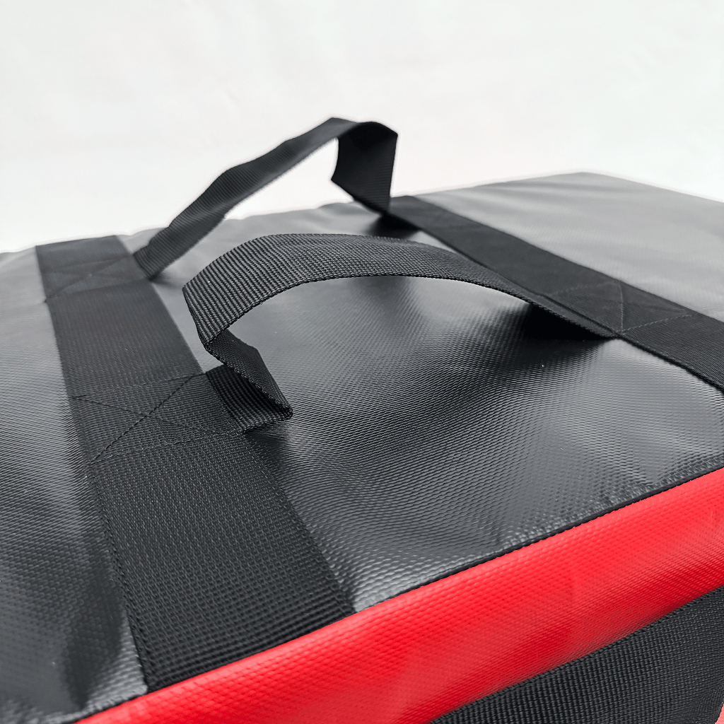 Close-up of kick shield with straps on a white background