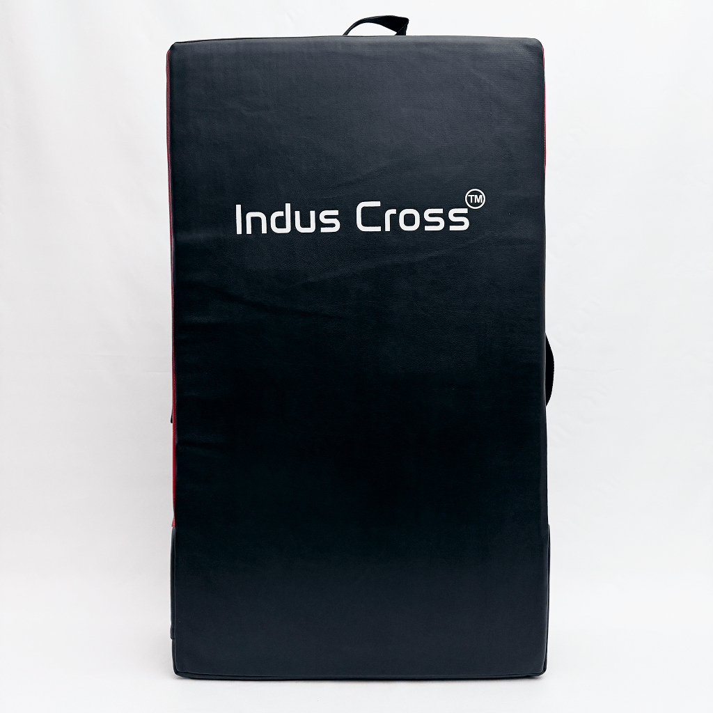 Kick Shield with 'Indus Cross' branding on a white background