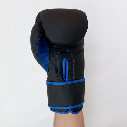 Black boxing glove with blue accents on a white background