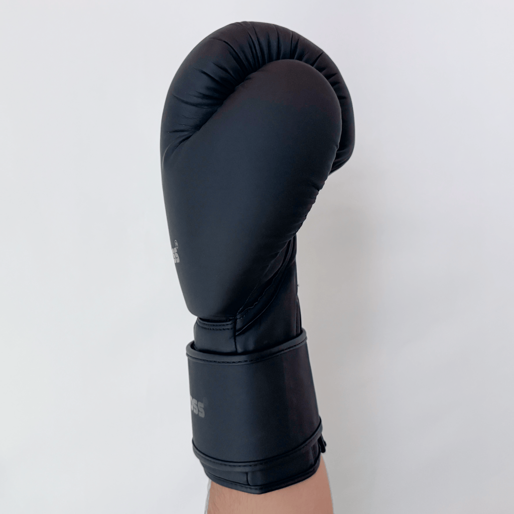 Black boxing glove on a white background