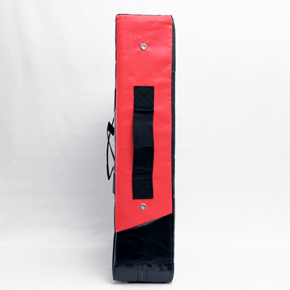 Side view of Kick Shield on a white background