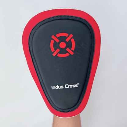 Red and black boxing focus mitts on a white background