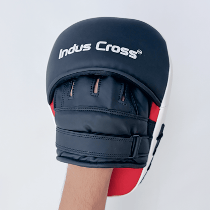 Black boxing mitt with 'Indus Cross' branding on a white background