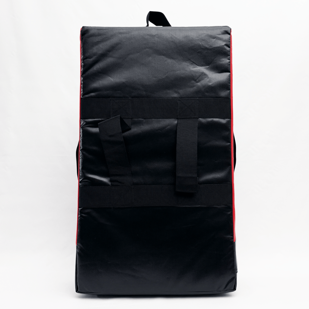 Back side of a kick shield on a white background