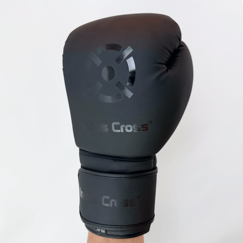 Black boxing glove with 'Cross' branding on a white background