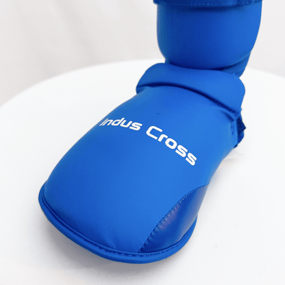 Blue shin guard with 'Indus Cross' branding on a white background